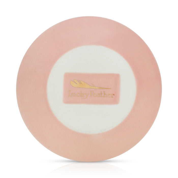 Pink and white plate with 'Lucky Feather' logo.