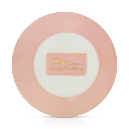 Pink and white plate with 'Lucky Feather' logo.