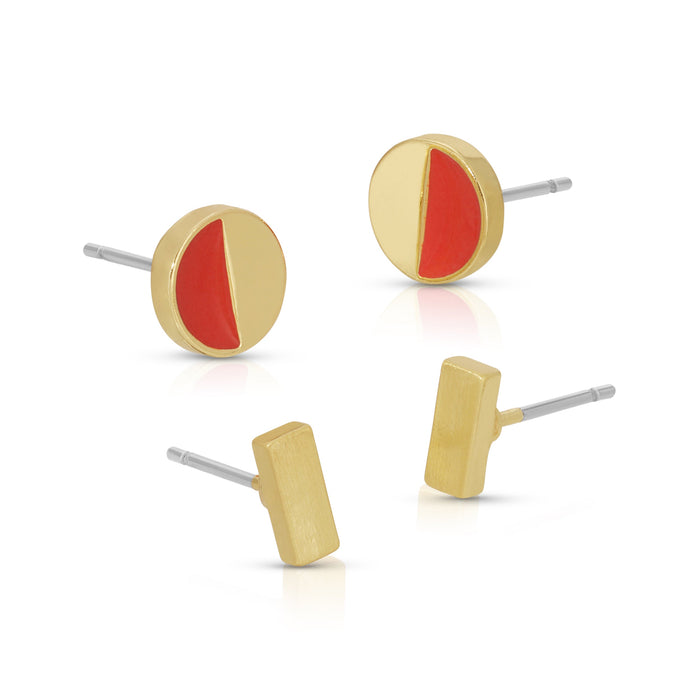 Two pairs of stud earrings, one pair round with gold and red details and one pair rectangular and gold, are displayed on a white surface.