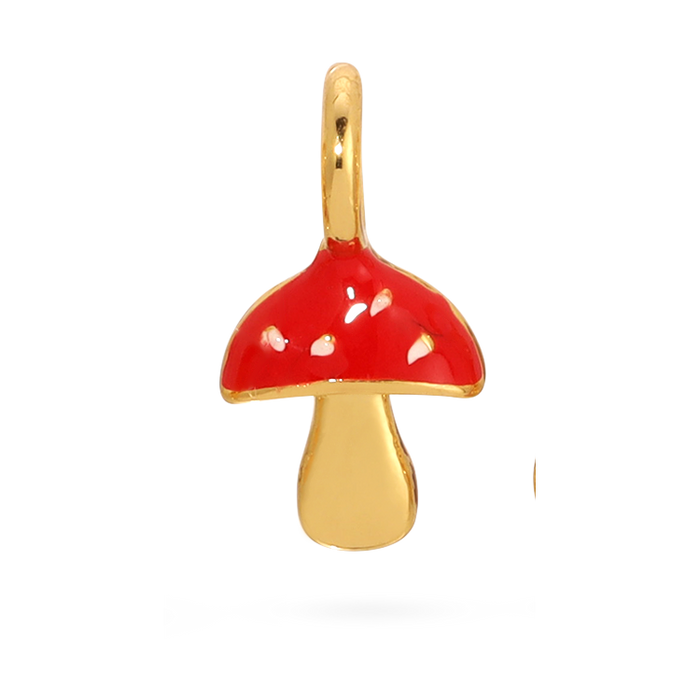 A gold mushroom charm with a red cap is against a black background.