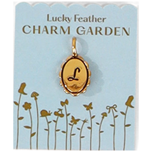 The image shows a 'Lucky Feather Charm Garden' card with an oval gold charm bearing the letter 'L'.
