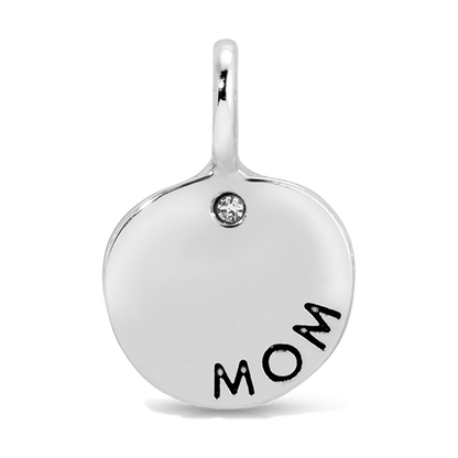 A silver pendant with a loop, a small gemstone, and the word 'MOM' engraved on it.