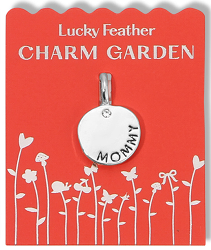 A 'Mommy' charm hangs on a red card labeled 'Lucky Feather Charm Garden.'