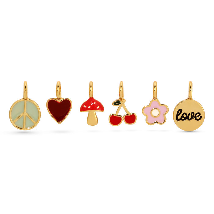 Six gold charms, including a peace sign, heart, mushroom, cherries, flower, and the word 'love,' are arranged in a row on a white background.