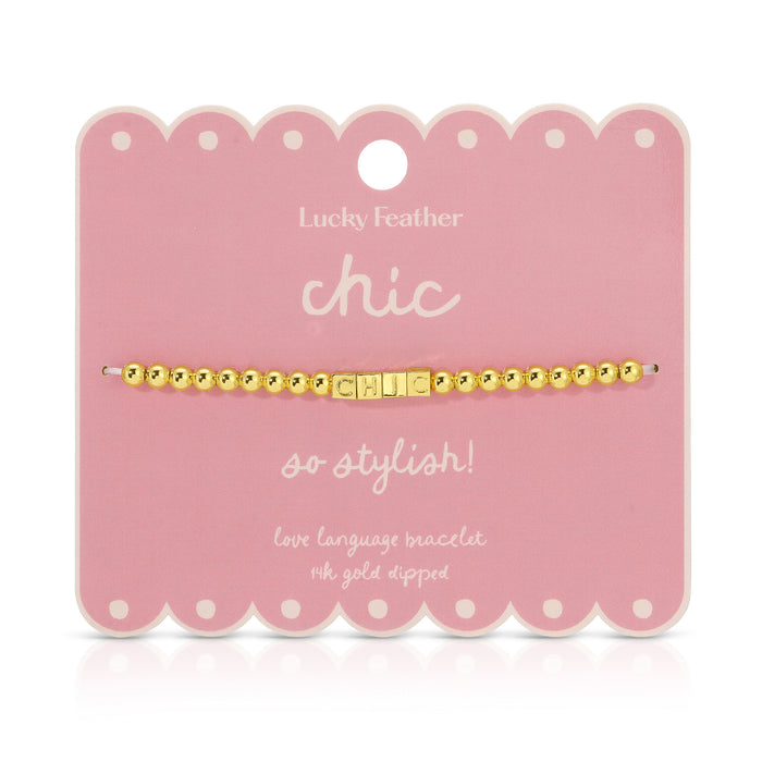 A 'Chic' beaded bracelet is displayed on its pink, scalloped product card.