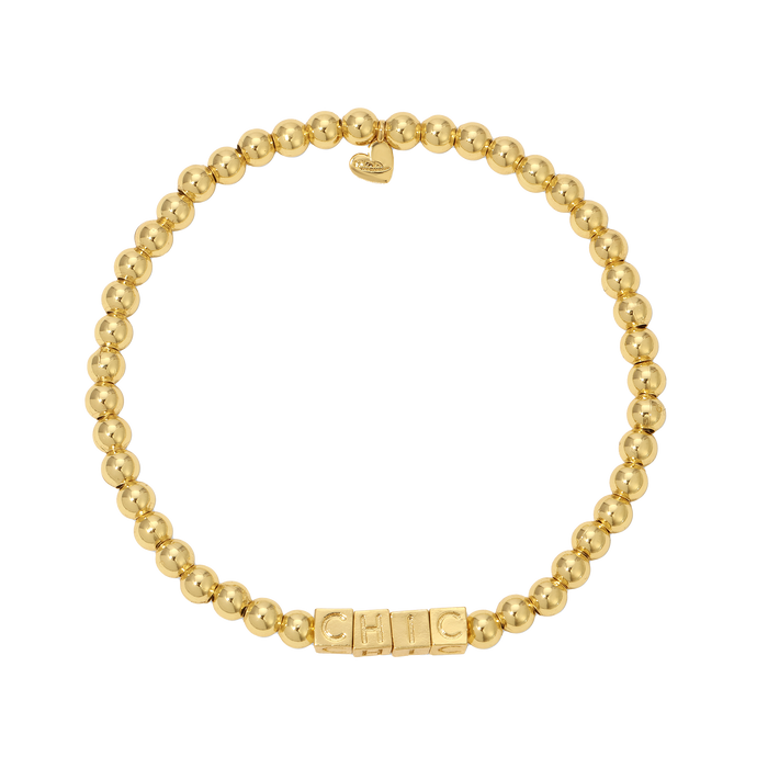 A bracelet composed of gold-colored beads spells the word 'CHIC' and has a heart charm.
