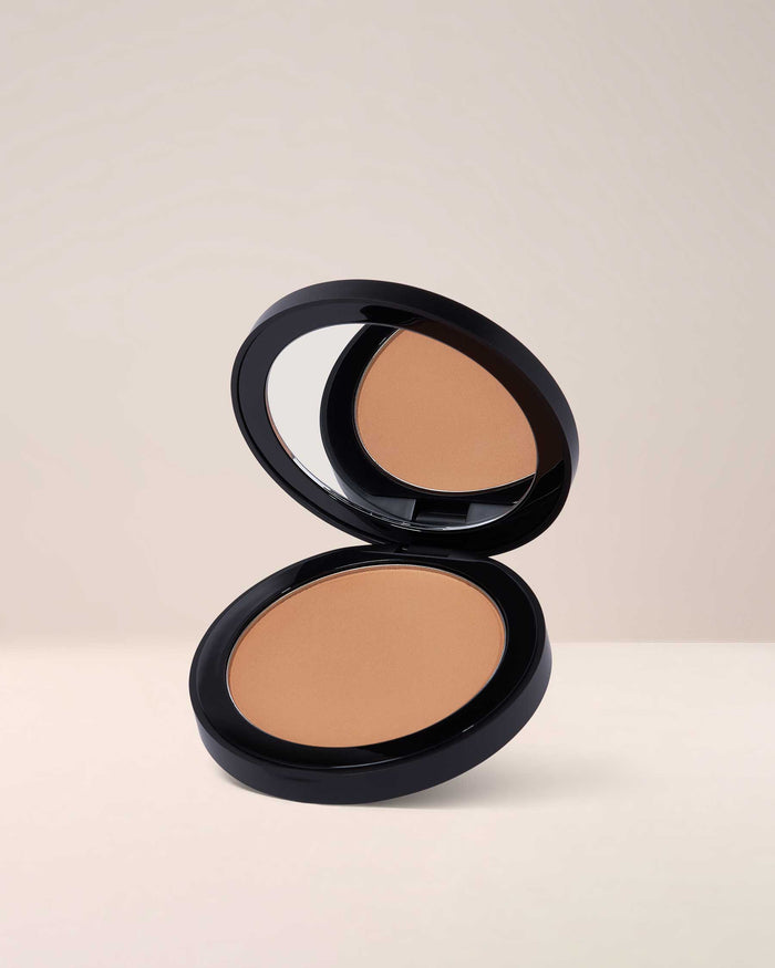 EM Cosmetics Corselette Sculpting Powder Bronzer in Slip, a fair-light shade for a natural, soft-matte contour.