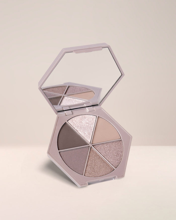 EM Cosmetics Divine Skies Palette in Saturn's Return, a 6-pan palette of cool grays, taupes, and shimmering silvers.