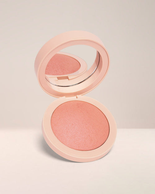 EM Cosmetics Heaven's Glow Blush in Magic Hour, a peachy nude powder blush with a soft, satin-pearl radiant finish.