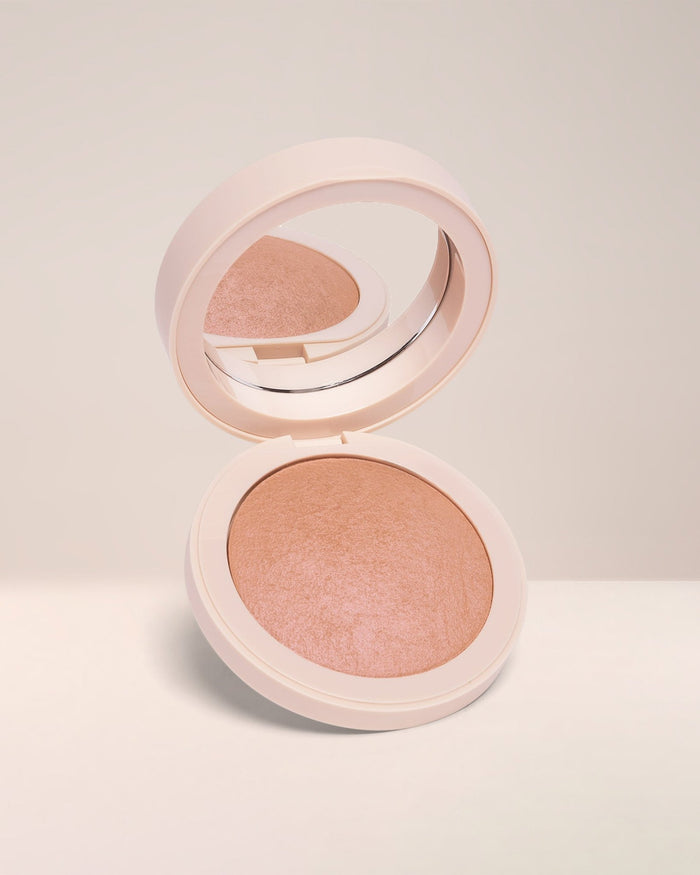EM Cosmetics Heaven's Glow Blush in Baroque, a peachy coral with gold reflects for a healthy, radiant cheek glow.