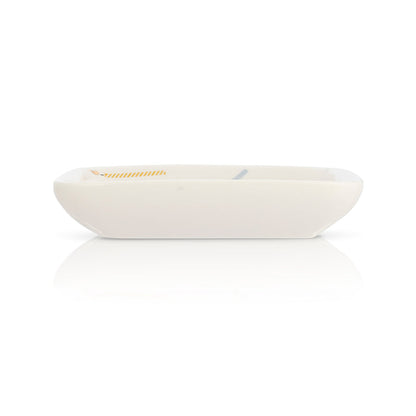 A small, shallow, white rectangular dish with rounded corners is displayed on a white background with a reflection.