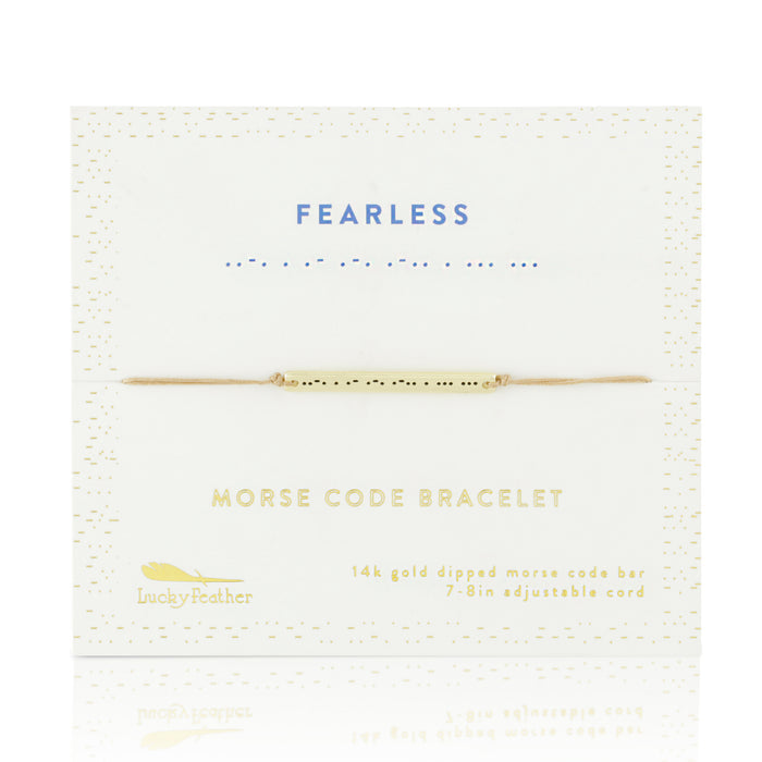 A 'Fearless' morse code bracelet by Lucky Feather is displayed on its packaging.