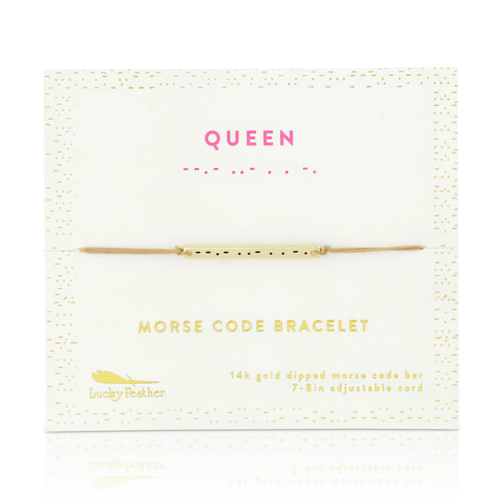 A 'Queen' morse code bracelet on a card.