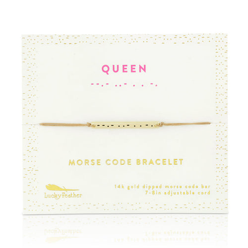 A 'Queen' morse code bracelet on a card.