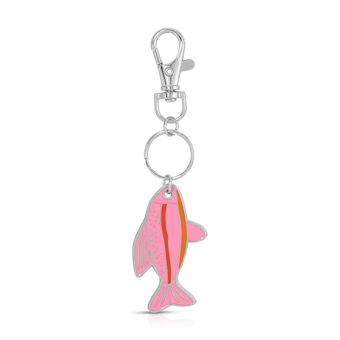 A pink fish-shaped keychain with silver hardware.