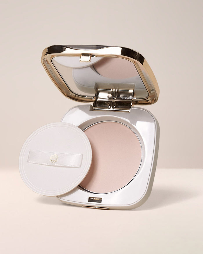 EM Cosmetics Portrait Mode Setting Powder shown open, revealing the finely-milled, translucent powder and applicator puff.