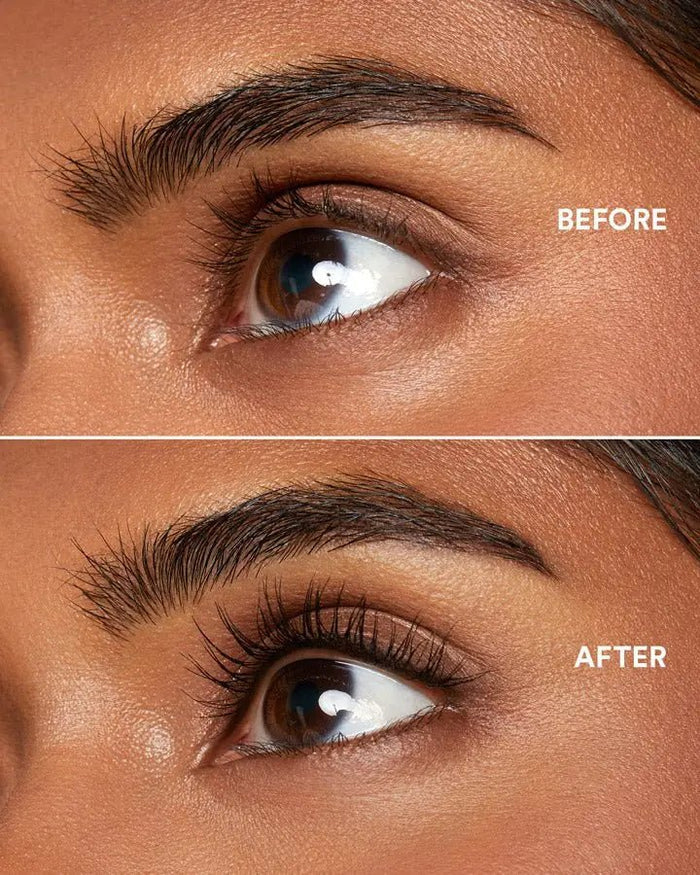 Model with dark skin demonstrating the impressive lengthening and volumizing effects of EM Cosmetics Shapeshift Tubing Mascara