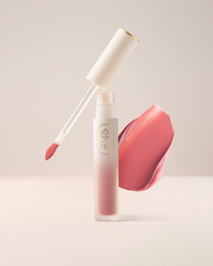 EM Cosmetics Soft Spoken Velvet Lip Creme in Whisper, a nude pink lipstick with a comfortable, soft-matte finish.