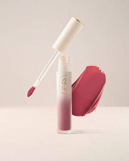 EM Cosmetics Soft Spoken Velvet Lip Creme in Intuition, a warm rose brown for a sophisticated, velvety pout.