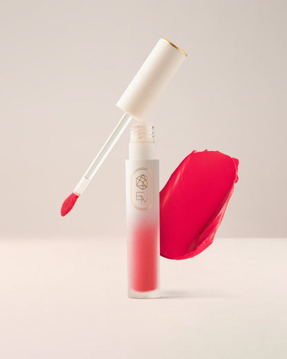 EM Cosmetics Soft Spoken Velvet Lip Creme in Flutter, a peachy nude shade for a soft, everyday velvet-matte lip.