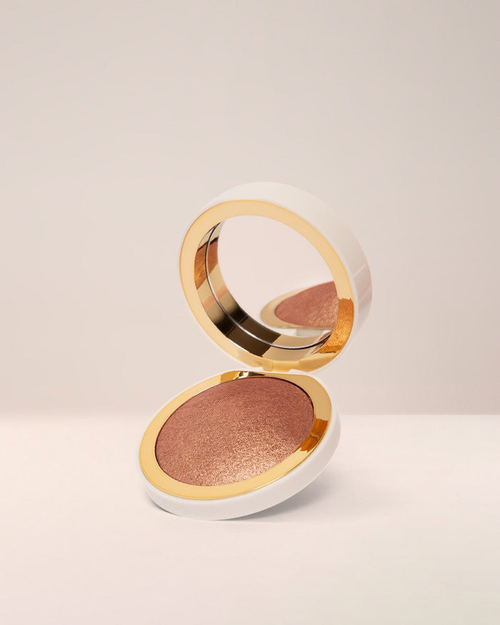 EM Cosmetics Sunscape Highlighter in Legendary, a rose gold powder highlighter for a radiant, lit-from-within glow.