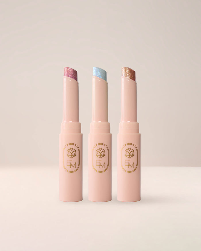 Collection of EM Cosmetics Three Wishes Glitter Wands, showing sparkling liquid glitters in three shades.
