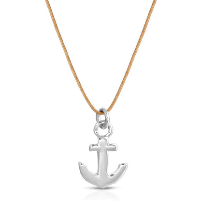 Silver anchor pendant hangs from a light brown cord against a white background.